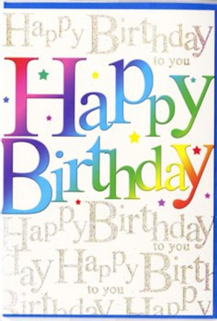 In this close-up photograph, a contemporary birthday card takes centre stage, radiating the same cheerful energy you might feel walking through Pimlico on a bright weekend morning. The main focus is the bold inscription Happy Birthday, spelled out in large, rounded capitals that curve slightly, giving them a friendly, almost balloon-like presence. Each letter is filled with a seamless gradient of colour, drifting from rich crimson into punchy coral, then through golden yellow, lime, teal, and royal blue, echoing the changing tones of a carefully arranged rainbow bouquet. The colours are saturated yet soft at the edges, as though brushed on in layers, creating a sense of depth and movement across the card's surface. Behind this headline, the background is alive with fine, looping script in metallic gold, repeating Happy Birthday to you in lines that weave across the card like delicate ribbons. The gold lettering has a subtle shimmer, reminiscent of the warm glow of streetlights along Grosvenor Road reflected on a calm evening. Tiny star-shaped flecks and dots in matching rainbow tones are scattered lightly around the main words, suggesting confetti settling after a joyful toast. The card stock looks smooth and slightly silky, with a gentle sheen that catches natural light without appearing glossy, similar to high-quality wrapping used by experienced florists. The framing keeps the viewer's eye entirely on the artwork, with soft, neutral surroundings that do not compete with the vibrant text. Overall, the design feels exuberant but not overwhelming-a polished, heartfelt birthday greeting that would pair beautifully with a hand-tied arrangement delivered across Pimlico, from the quiet residential streets near St George's Square to the busier corners close to Victoria.
